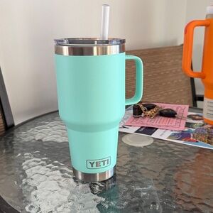 35oz teal yeti rambler travel mug with straw lid